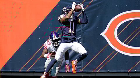 Chicago Bears wide receiver Darnell Mooney (11) catches a 15-yard touchdown pass as New York Giants cornerback Corey Ballentine (25) defends during the first half of an NFL football game in Chicago, Sunday, Sept. 20, 2020.