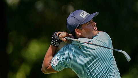 Sebastian Munoz tees off on the first hole during the second round of the Tour Championship golf tournament at East Lake Golf Club in Atlanta, Saturday, Sept. 5, 2020.