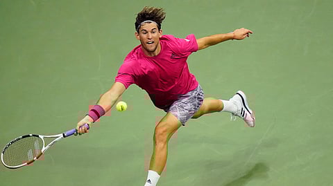 Dominic Thiem, of Austria, returns a shot to Marin Cilic, of Croatia, during the third round of the US Open tennis championships, Saturday, Sept. 5, 2020, in New York.