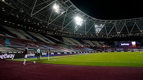 West Ham's Robert Snodgrass preparing to take a corner during the English League Cup soccer match between West Ham and Hull City at the London Stadium in London, Tuesday, Sept. 22, 2020.