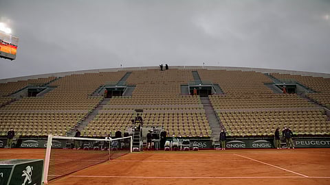 A near-empty Suzanne Lenglen court is seen yesterday during the Johanna Konta vs. Cori Gauff match at the Roland Garros stadium in Paris, France, Sunday, Sept. 27, 2020.