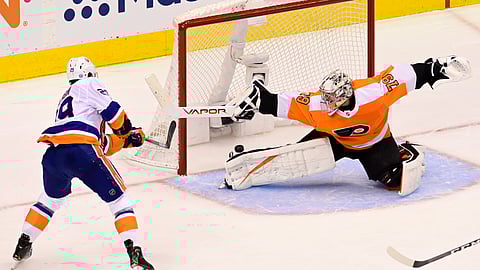 New York Islanders center Brock Nelson (29) scores against Philadelphia Flyers goaltender Carter Hart (79) during second-period NHL Stanley Cup Eastern Conference playoff hockey game action in Toronto, Saturday, Sept. 5, 2020.