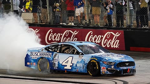 Kevin Harvick does a burnout after winning the NASCAR Cup Series auto race Saturday, Sept. 19, 2020, in Bristol, Tenn.