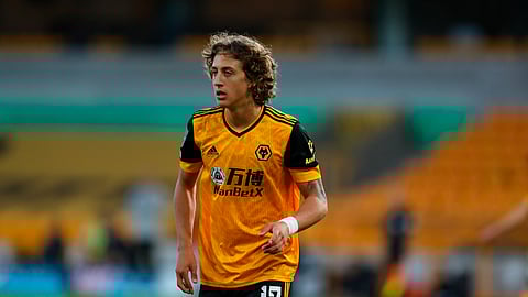 Wolverhampton Wanderers' Fabio Silva runs during the English League Cup soccer match between Wolverhampton Wanderers and Stoke City, in Molineux Stadium in Wolverhampton, England, Thursday, Sept. 17, 2020.