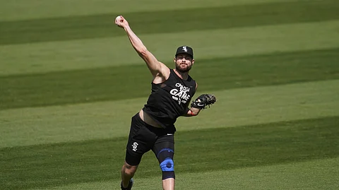 Chicago White Sox pitcher Lucas Giolito throws at practice during a baseball workout in Oakland, Calif., Monday, Sept. 28, 2020. The White Sox are scheduled to play the Oakland Athletics in an American League wild-card playoff series starting Tuesday.