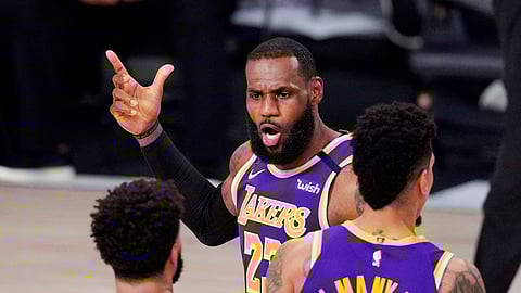 Los Angeles Lakers' LeBron James (23) voices his opinion after a play in the second half of an NBA conference final playoff basketball game against the Denver Nuggets Saturday, Sept. 26, 2020, in Lake Buena Vista, Fla.