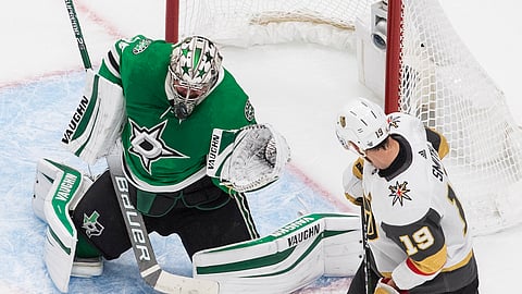 Dallas Stars goalie Anton Khudobin makes a save on Vegas Golden Knights' Reilly Smith (19) during the first period of Game 4 of the NHL hockey Western Conference final, Saturday, Sept. 12, 2020, in Edmonton, Alberta.