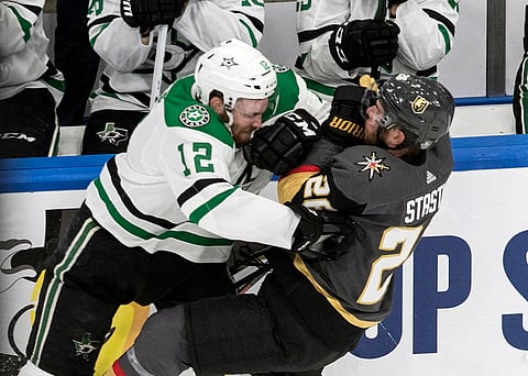 Vegas Golden Knights' Paul Stastny (26) is checked by Dallas Stars' Radek Faksa (12) during the first period of Game 1 of an NHL Western Conference final hockey game, Sunday, Sept. 6, 2020 in Edmonton, Alberta.
