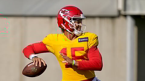FILE - Kansas City Chiefs quarterback Patrick Mahomes throws a pass during NFL football training camp Friday, Aug. 21, 2020, in Kansas City, Mo.