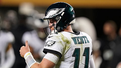 Philadelphia Eagles quarterback Carson Wentz (11) gestures during the second half of an NFL football game against the San Francisco 49ers in Santa Clara, Calif., Sunday, Oct. 4, 2020.
