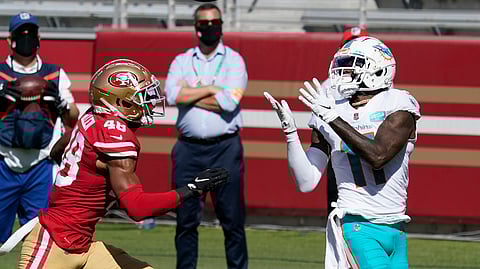 Miami Dolphins wide receiver DeVante Parker (11) catches a touchdown against San Francisco 49ers cornerback Brian Allen (48) during the first half of an NFL football game in Santa Clara, Calif., Sunday, Oct. 11, 2020.