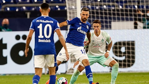 Schalke's Vedad Ibisevic controls the ball during the German Bundesliga soccer match between FC Schalke 04 and Werder Bremen in Gelsenkirchen, Germany, Saturday, Sept. 26, 2020.