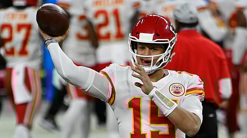 Kansas City Chiefs quarterback Patrick Mahomes (15) warms up before an NFL football game against the Las Vegas Raiders, Sunday, Nov. 22, 2020, in Las Vegas.