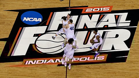 Duke players celebrate after the NCAA Final Four college basketball tournament championship game against Wisconsin in Indianapolis, in this Monday, April 6, 2015, file photo. The NCAA announced Monday, Nov. 16, 2020, it plans to hold the entire 2021 men’s college basketball tournament in one location to mitigate the risks of COVID-19 and is in talks with Indianapolis to be the host city.