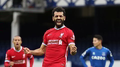 Liverpool's Mohamed Salah celebrates scoring a goal.