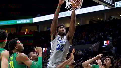 Memphis center James Wiseman (32) dunks against Oregon during the second half of an NCAA college basketball game on Tuesday, Nov. 12, 2019. The 7-foot-1 left-hander will be one of the first players selected in Wednesday’s, Nov. 18, 2020, NBA draft. It’s hard to envision a scenario where he doesn’t go in the first three picks, which are currently held by Minnesota, Golden State and Charlotte.