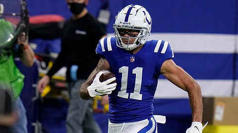 Indianapolis Colts' Michael Pittman (11) runs in for a touchdown during the first half of an NFL football game against the Green Bay Packers, Sunday, Nov. 22, 2020, in Indianapolis.