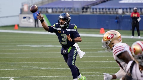 Seattle Seahawks quarterback Russell Wilson passes against the San Francisco 49ers during the second half of an NFL football game, Sunday, Nov. 1, 2020, in Seattle.