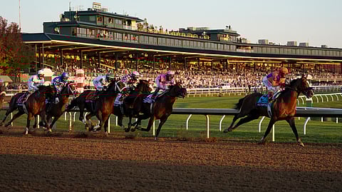 John Velazquez (9) rides Authentic to win the Breeder's Cup Classic horse race at Keeneland Race Course, in Lexington, Ky., Saturday, Nov. 7, 2020.