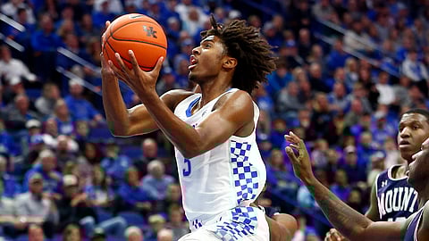 In this Friday, Nov. 22, 2019 file photo, Kentucky's Tyrese Maxey, left, shoots near Mount St. Mary's Malik Jefferson during the first half of an NCAA college basketball game in Lexington, Ky. The Philadelphia 76ers selected Kentucky guard Tyrese Maxey with the 21st pick of the NBA draft, Wednesday, Nov. 18, 2020, the first selection under the new regime led by president Daryl Morey.