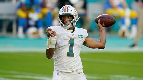 Miami Dolphins quarterback Tua Tagovailoa (1) looks to pass the football during the first half of an NFL football game against the Los Angeles Chargers, Sunday, Nov. 15, 2020, in Miami Gardens, Fla.