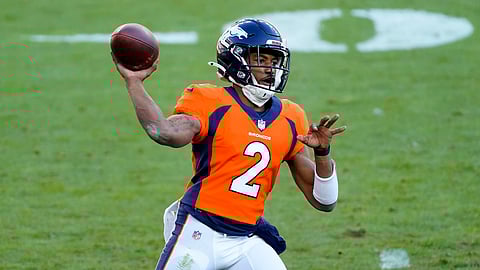 Denver Broncos quarterback Kendall Hinton (2) throws against the New Orleans Saints during the first half of an NFL football game, Sunday, Nov. 29, 2020, in Denver. With all 4 rostered QB's down with COVID-19, Denver had to turn to Hinton, normally a WR, to start on Sunday.