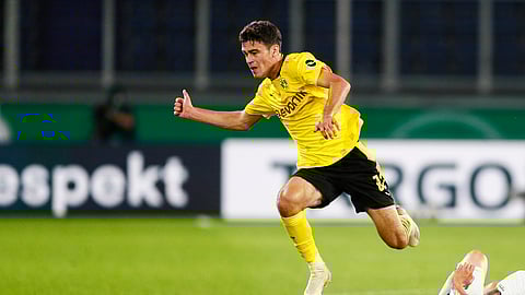 FILE - In this Sept. 14, 2020, file photo, Dortmund's Giovanni Reyna plays during a first round German Soccer Cup match against MSV Duisburg in Duisburg, Germany. Borussia Dortmund said Friday, Nov. 20, 2020, that the 18-year-old Reyna, the youngest American to play in the Bundesliga, signed a new deal through June 2025.