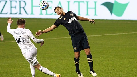 Philadelphia Union's Alejandro Bedoya (right) and Chicago Fire's Djordje Mihailovic battle for a ball in October