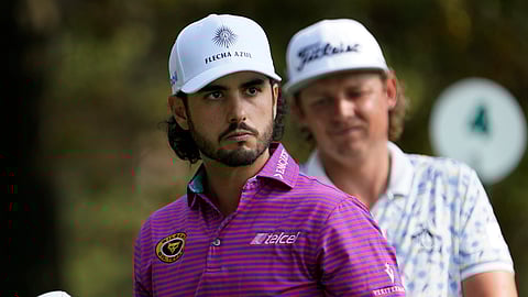 Abraham Ancer, left, of Mexico, and Cameron Smith, of Australia, wait to tee off on the fourth hole during the third round of the Masters golf tournament Saturday, Nov. 14, 2020, in Augusta, Ga. Ancer is one of Kern's picks to win or place in the top 5 at the Mayakoba Golf Classic.