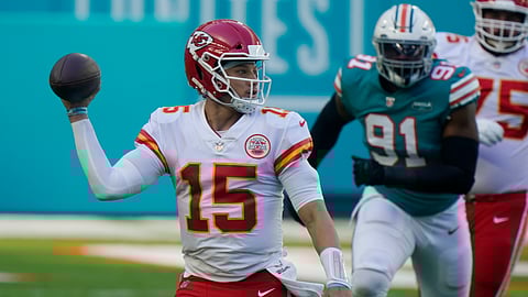 Kansas City Chiefs quarterback Patrick Mahomes (15) looks to pass the football during the first half of an NFL football game against the Miami Dolphins, Sunday, Dec. 13, 2020, in Miami Gardens, Fla.
