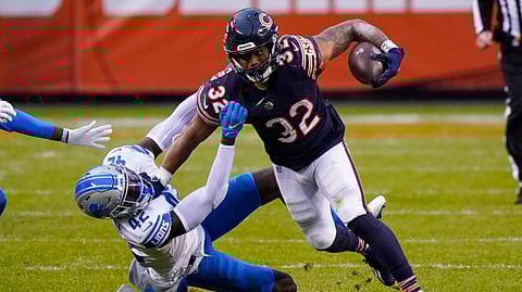 Detroit Lions safety Jayron Kearse (42) tackles Chicago Bears running back David Montgomery (32) in the second half of an NFL football game in Chicago, Sunday, Dec. 6, 2020.