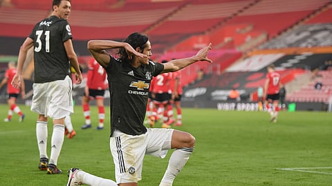 Manchester United's Edinson Cavani celebrates after scoring his side's second goal during an English Premier League soccer match between Southampton and Manchester United at the St. Mary's stadium in Southampton, England, Sunday, Nov. 29, 2020.