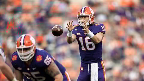Clemson quarterback Trevor Lawrence (16) takes a snap during the first half of an NCAA college football game against Pittsburgh Saturday, Nov. 28, 2020, in Clemson, S.C.