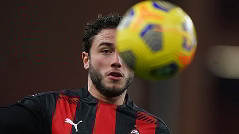 Milan's Davide Calabria eyes the ball during the match against Sampdoria during their Italian Serie A soccer match between Sampdoria and AC Milan, at the Luigi Ferraris Stadium, in Genoa, Italy, Sunday, Dec. 6, 2020.