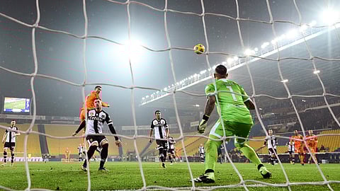 Juventus' Cristiano Ronaldo scores his side's second goal during the Italian Serie A soccer match between Parma and Juventus at the Ennio Tardini stadium in Parma, Italy, Saturday, Dec. 19, 2020.