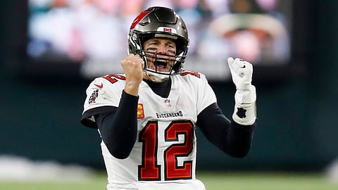 Tampa Bay Buccaneers quarterback Tom Brady reacts after winning the NFC championship NFL football game against the Green Bay Packers in Green Bay, Wis., Sunday, Jan. 24, 2021. The Buccaneers defeated the Packers 31-26 to advance to the Super Bowl.