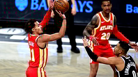 The scoring comes easily for Atlanta Hawks guard Trae Young. Tonight he needs to concentrate on his rebounding.