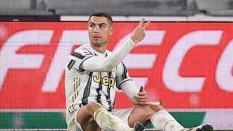 Juventus' Cristiano Ronaldo gestures during the Serie A soccer match between Juventus and Fiorentina, at the Allianz Stadium in Turin, Italy, Tuesday, Dec. 22, 2020.