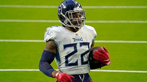 Tennessee Titans running back Derrick Henry (22) rushes for a touchdown against the Houston Texans during the second half of an NFL football game Sunday, Jan. 3, 2021, in Houston.