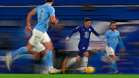 Chelsea's Christian Pulisic runs with the ball during the English Premier League soccer match between Chelsea and Manchester City at Stamford Bridge, London, England, Sunday, Jan. 3, 2021.