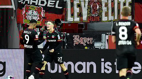 Leverkusen's Florian Wirtz celebrates after scoring his side's second goal during the German Bundesliga soccer match between Bayer Leverkusen and Borussia Dortmund in Leverkusen, Germany, Tuesday, Jan. 19, 2021.