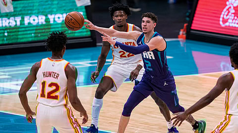 Charlotte Hornets guard LaMelo Ball (2) passes against the Atlanta Hawks.