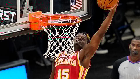 Atlanta Hawks center Clint Capela goes to the basket during the second half of the team's NBA basketball game against the Utah Jazz Friday, Jan. 15, 2021, in Salt Lake City.