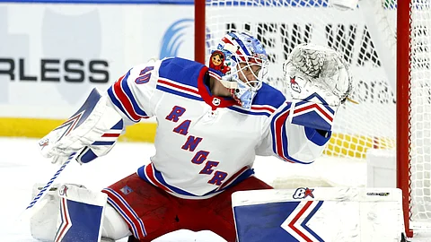 New York Rangers goalie Alexandar Georgiev makes a save during the first period of an NHL hockey game against the Buffalo Sabres.