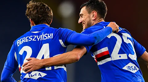 Sampdoria players celebrate a goal.