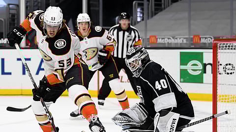 The Anaheim Ducks look to score in front of the net.