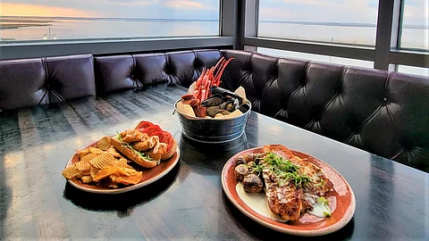 A view of the dishes and the view at Rum Point Crab House at Harrah's Resort Atlantic City.
