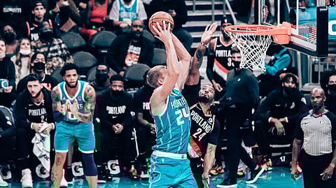 Mason Plumlee doesn't shoot a lot, but he probably shouldn't pass up this one in order to pass to an open Miles Bridges in the corner.
