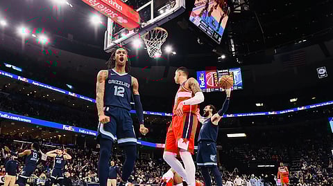 Ja Morant celebrates after doing a Ja Morant thing.