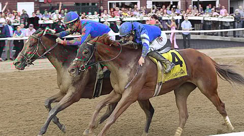 Bell's the One, on the outside, pulling ahead in last July's Honorable Miss.